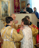 Причащение на престольном празднике в храме Иоанна Кронштадтского п. Ува 2 января 2003 года