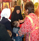 Причащение на праздничной службе в Михаило-Архангельском храме г. Можга